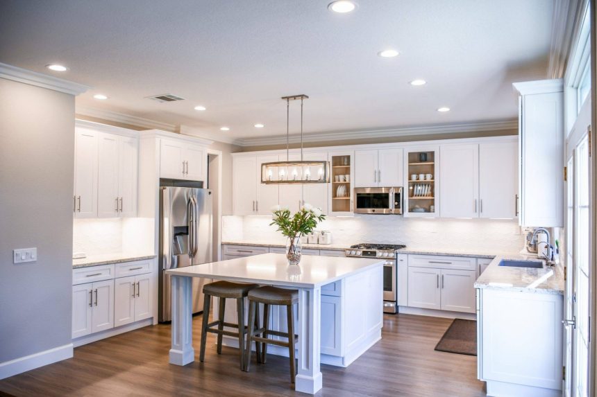 Bright remodeled kitchen filled with daylight from large glazed doors